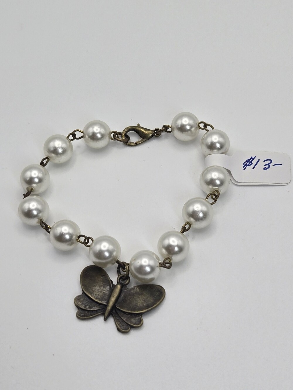 Faux Pearl And Bronze Finnish Moth Charm Bracelet